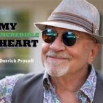 Derrick Procell wearing sunglasses and a hat on the artwork for his album My Incredible Heart.