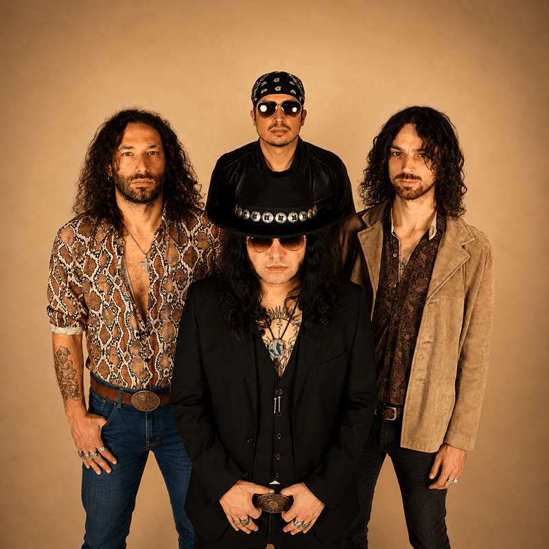 British rock band Leadfeather, four band members posing together against a beige background.