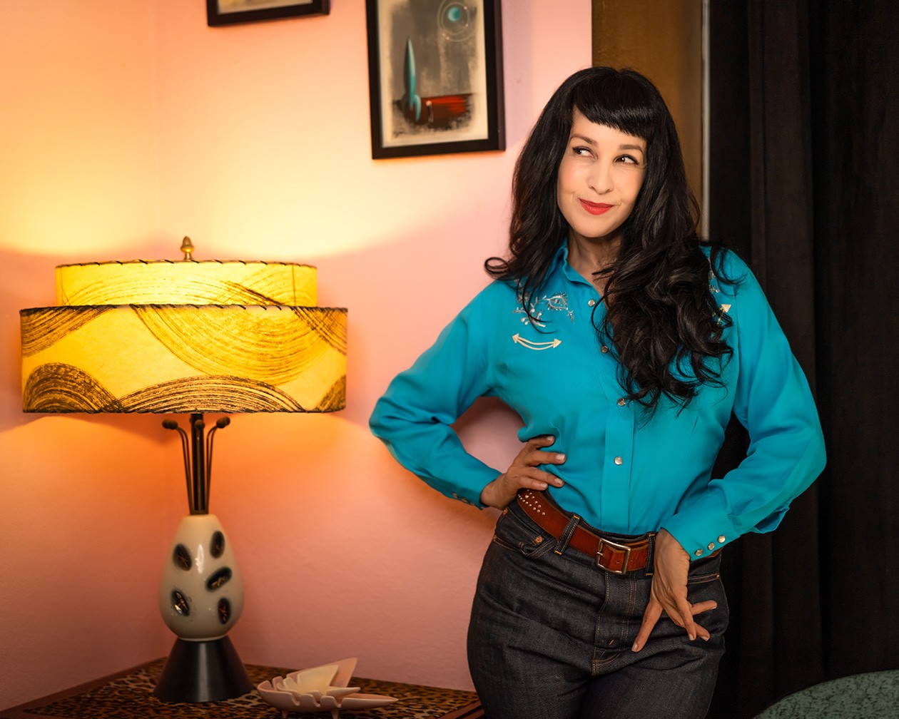 Grey DeLisle, standing in the room